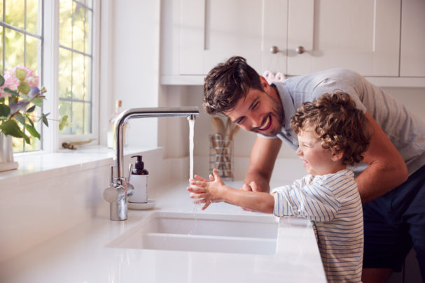 PE1021_dad-son-using-kitchen-faucet.jpg