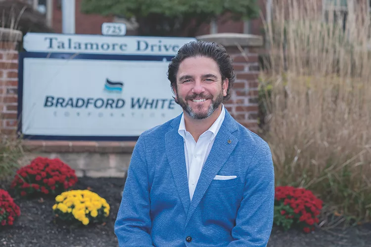 Jim in front of sign.jpg