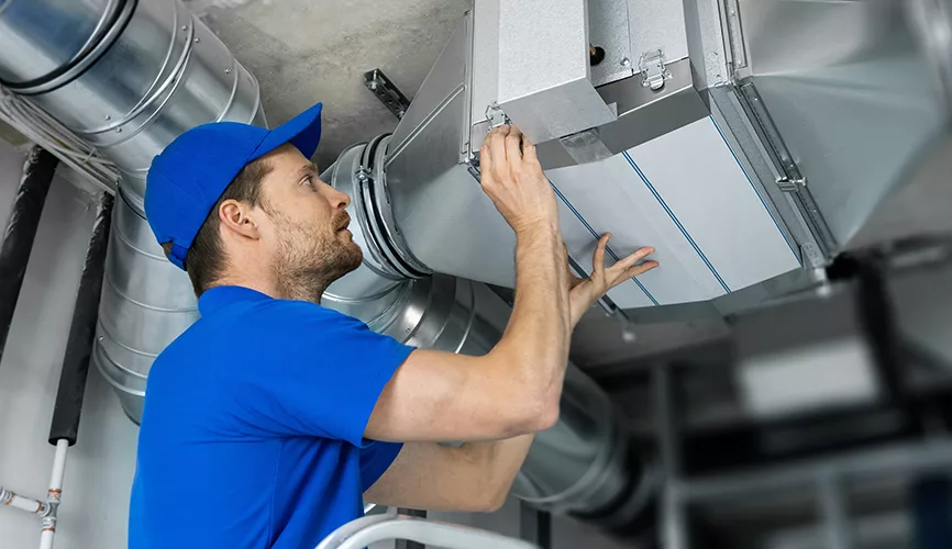 PHCN0525_residential HVAC repair tech.jpg