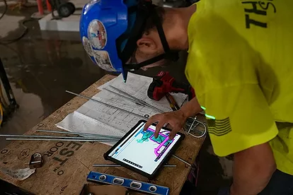 Tech on jobsite   1 copy