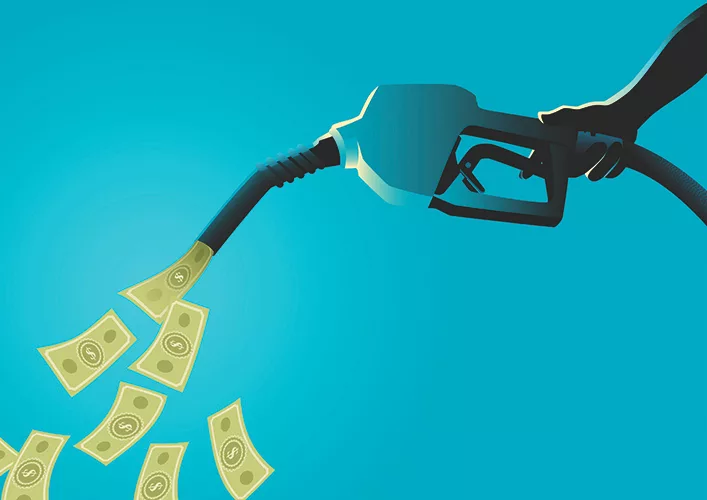 TW0526_gas pump pouring out money.jpg