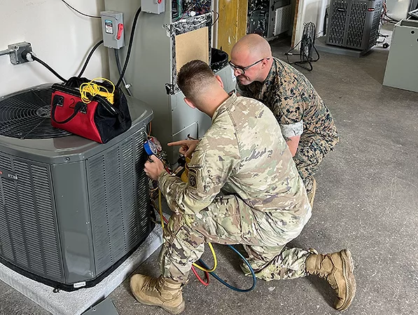 Marine and Army working on Unit 2.jpg