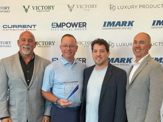 Merit Brass Named IMARK Plumbing Supplier of the Year.jpg