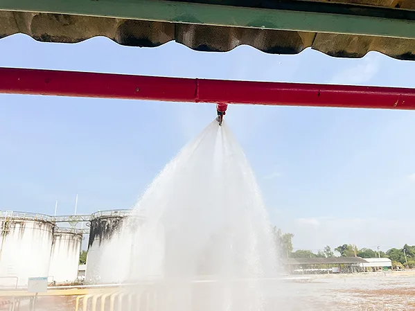 PE0926_Industrial Fire Sprinkler System Discharging Water.jpg