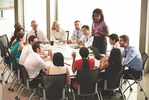 TW0726_businesswomen speaking to colleagues.jpg