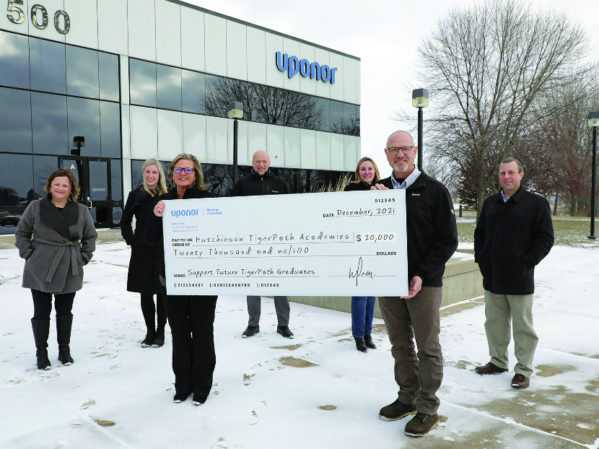 Uponor Hires 100th Employee in Hutchinson, Donates to TigerPath